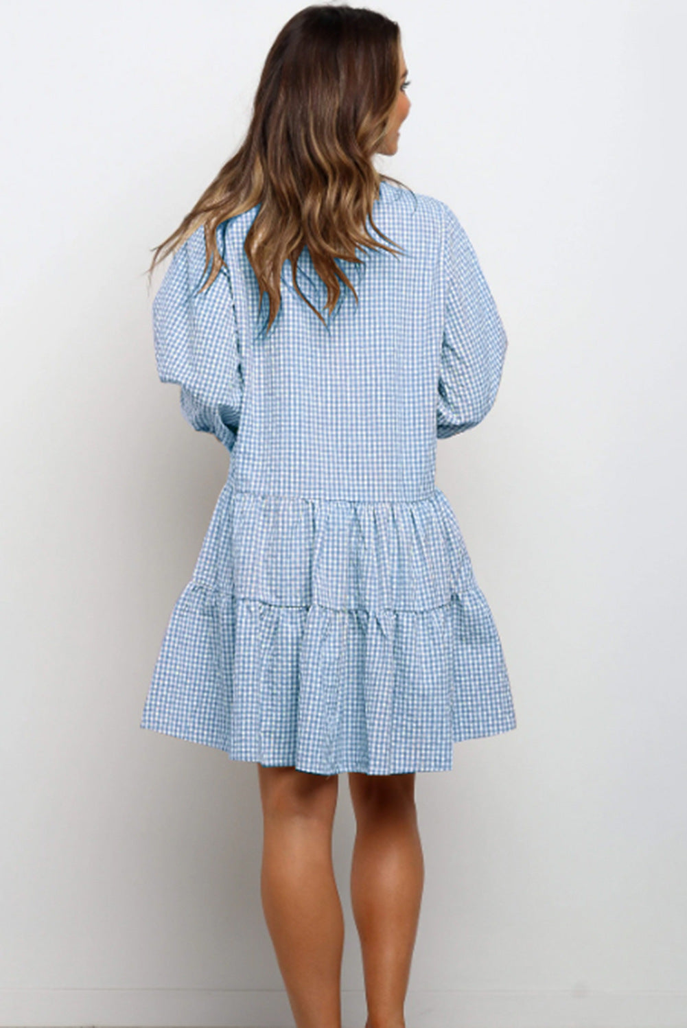 Ruffled dress with checked pattern